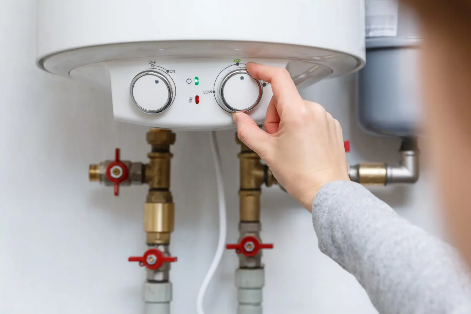 Technician adjusting a water heater in Camarillo